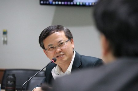 A picture containing person, indoor, man, computer Description automatically generated