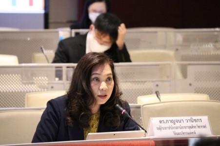 A person sitting in front of a computer Description automatically generated