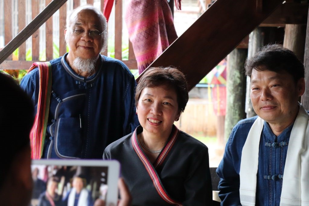 A group of people posing for the camera Description automatically generated