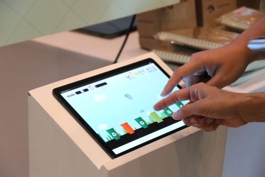 A person using a tablet  Description automatically generated